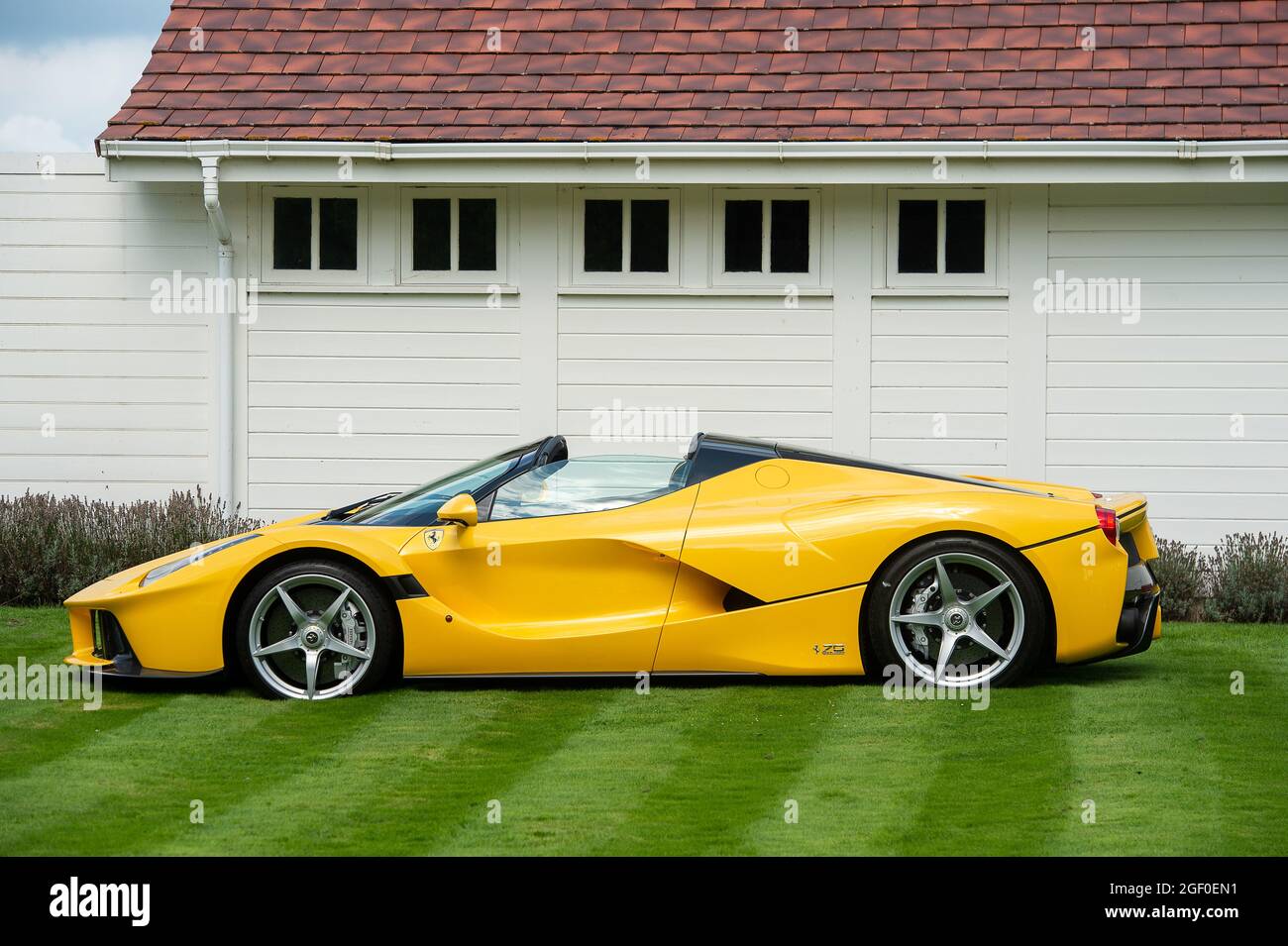 Egham, Surrey, UK. 22nd August, 2021. Ferraris parked outside the Royal Box at Guards Polo Club. Credit: Maureen McLean/Alamy Live News Stock Photo
