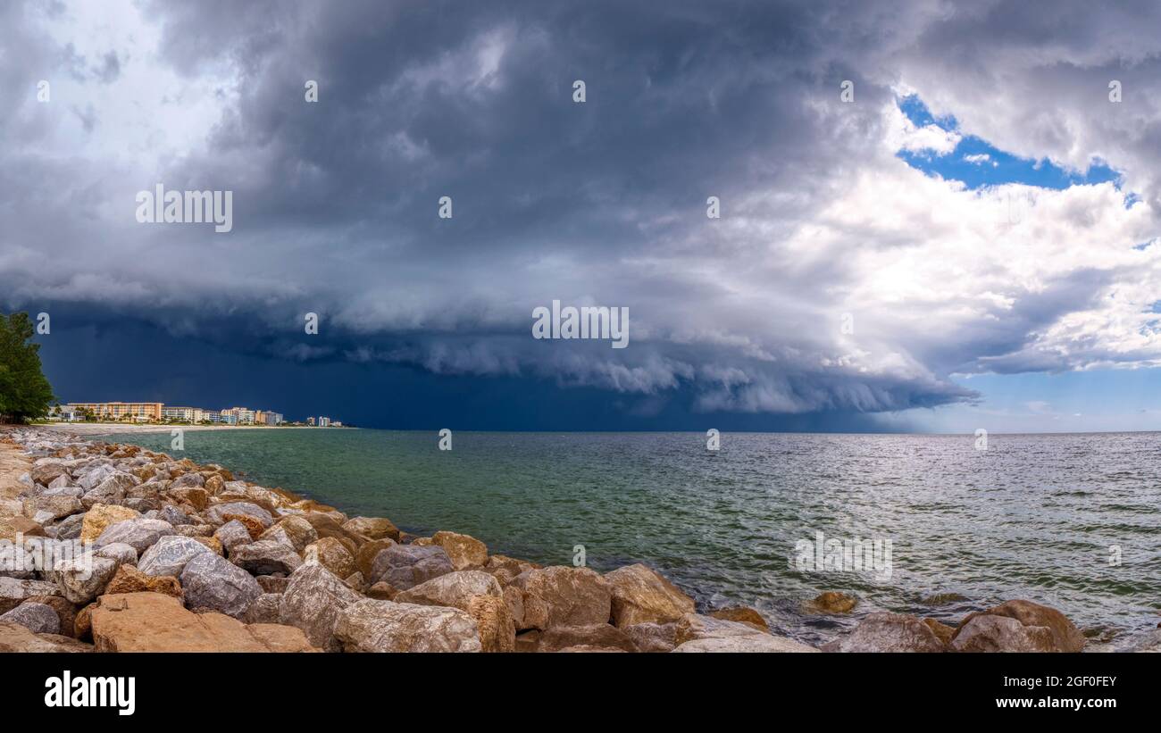 Dark sky of storm over Gulf of Mexico and Venice Florida USA Stock Photo