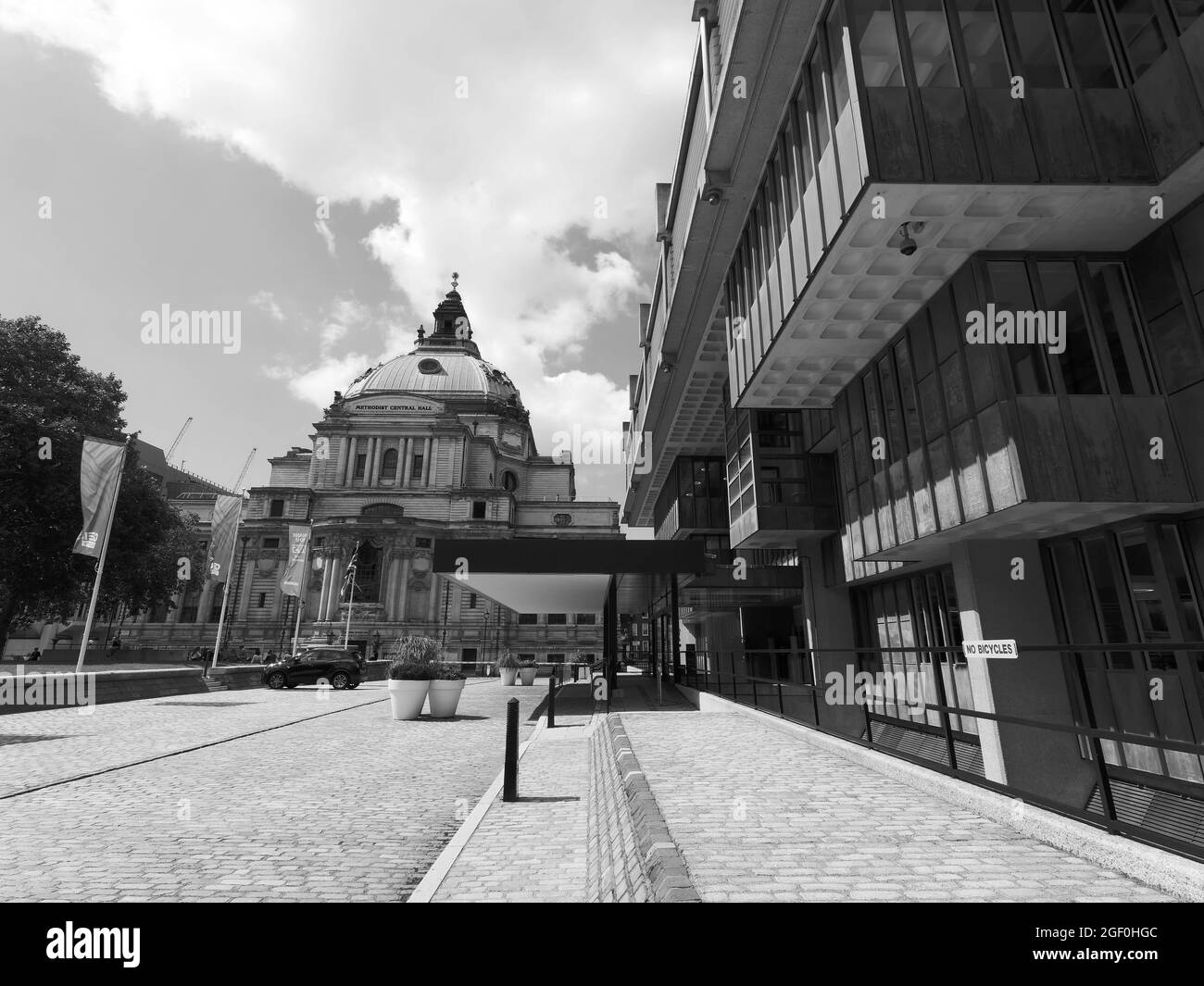 London, Greater London, England, August 10 2021: Left, Central Hall Westminster aka Methodist Central Hall. Stock Photo