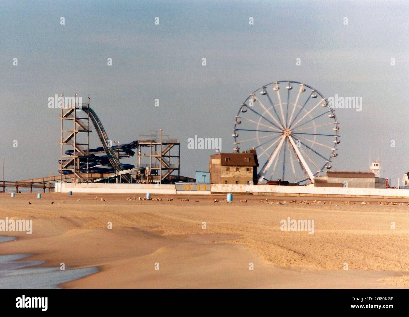 Giant Wheel and a waterslide on the Boardwalk in Ocean City, Maryland