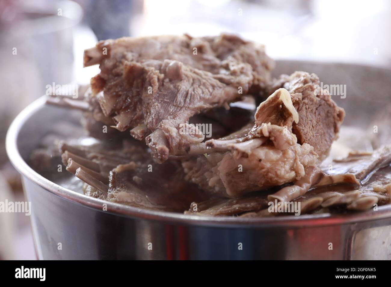 Hand tore the lamb chops hi-res stock photography and images - Alamy