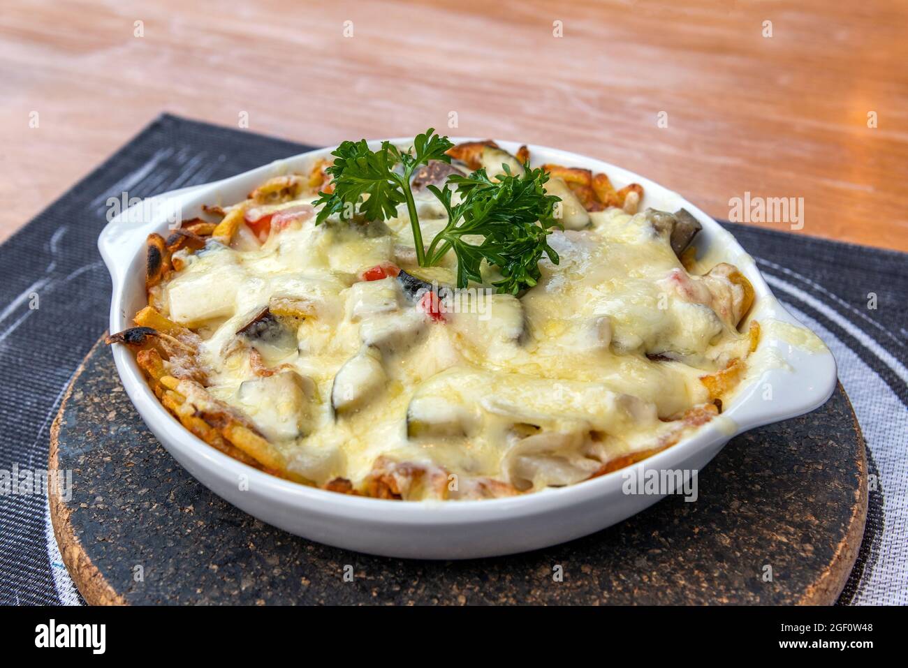 Plate of rosti served in a restaurant in Zermatt, Valais, Switzerland Stock Photo