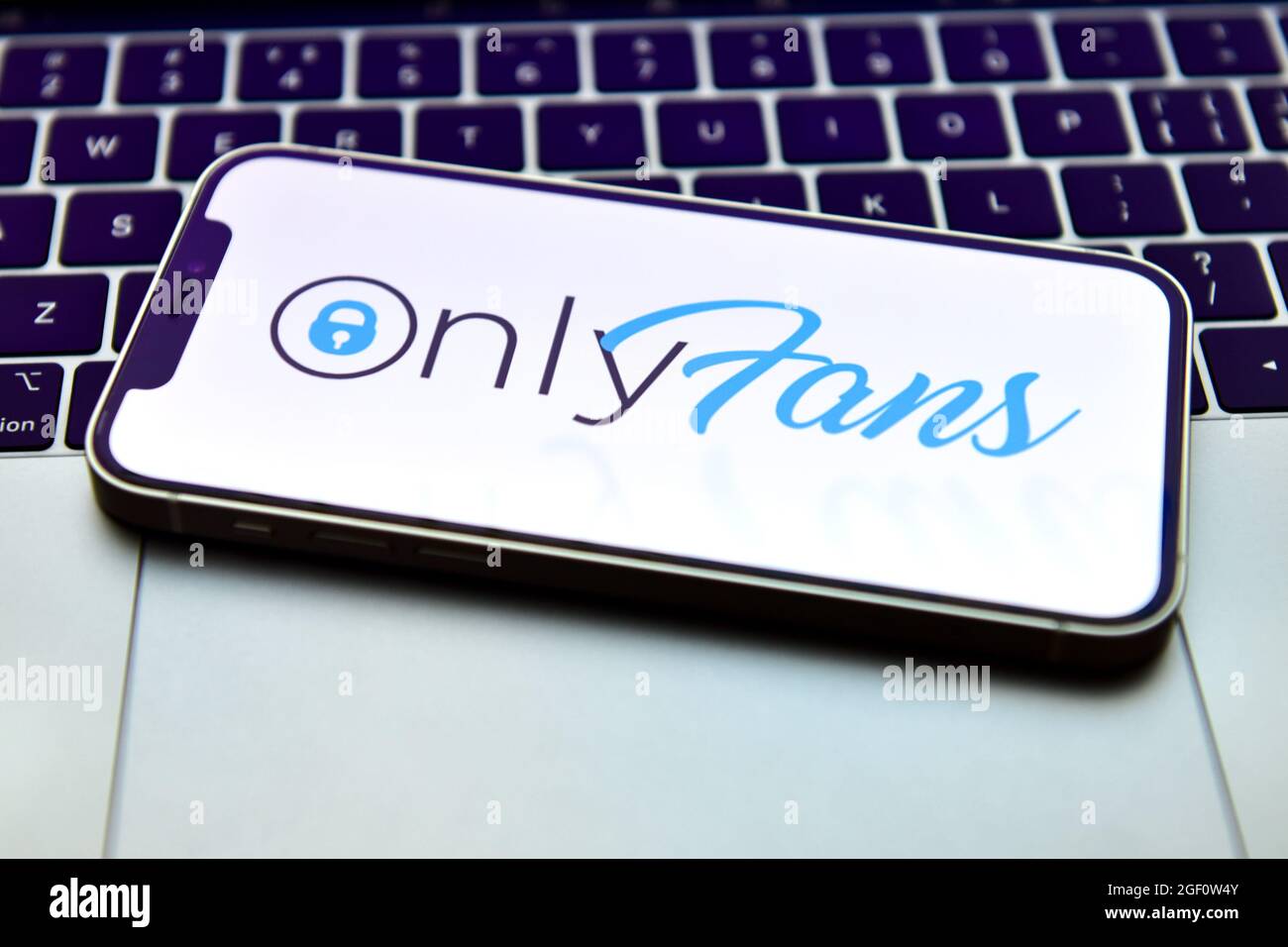 In this photo illustration, an OnlyFans logo seen displayed on a smartphone  Stock Photo - Alamy