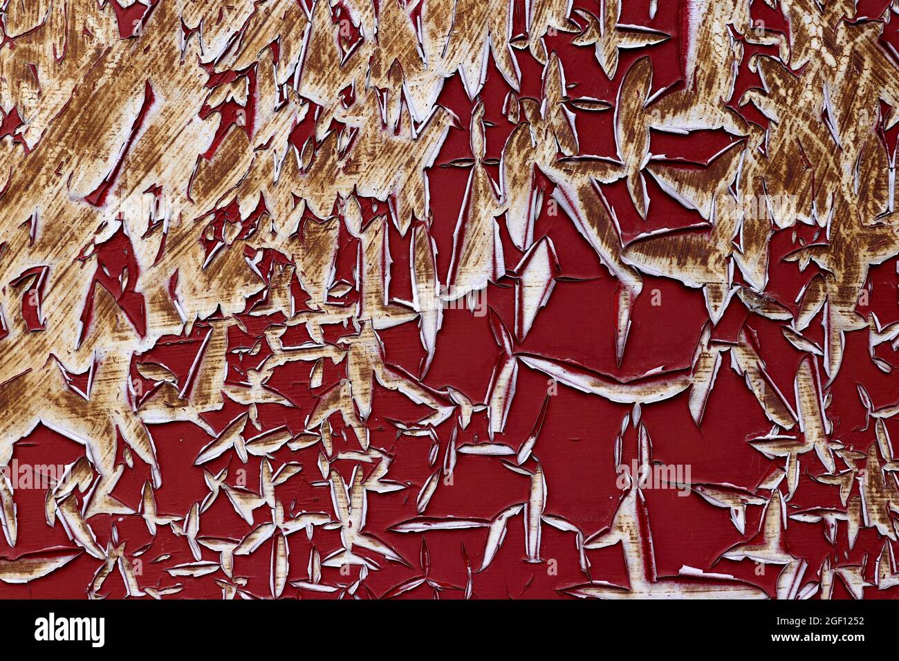 Detail of the cracked and peeled paint on the iron surface Stock Photo