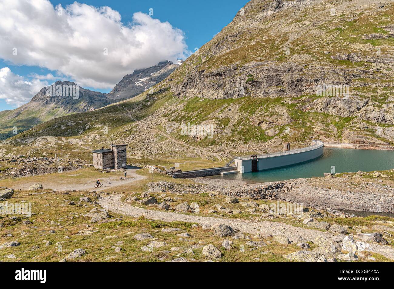 Dam wall at Lago Bianco at Bernina Pass, Grisons, Switzerland Stock Photo