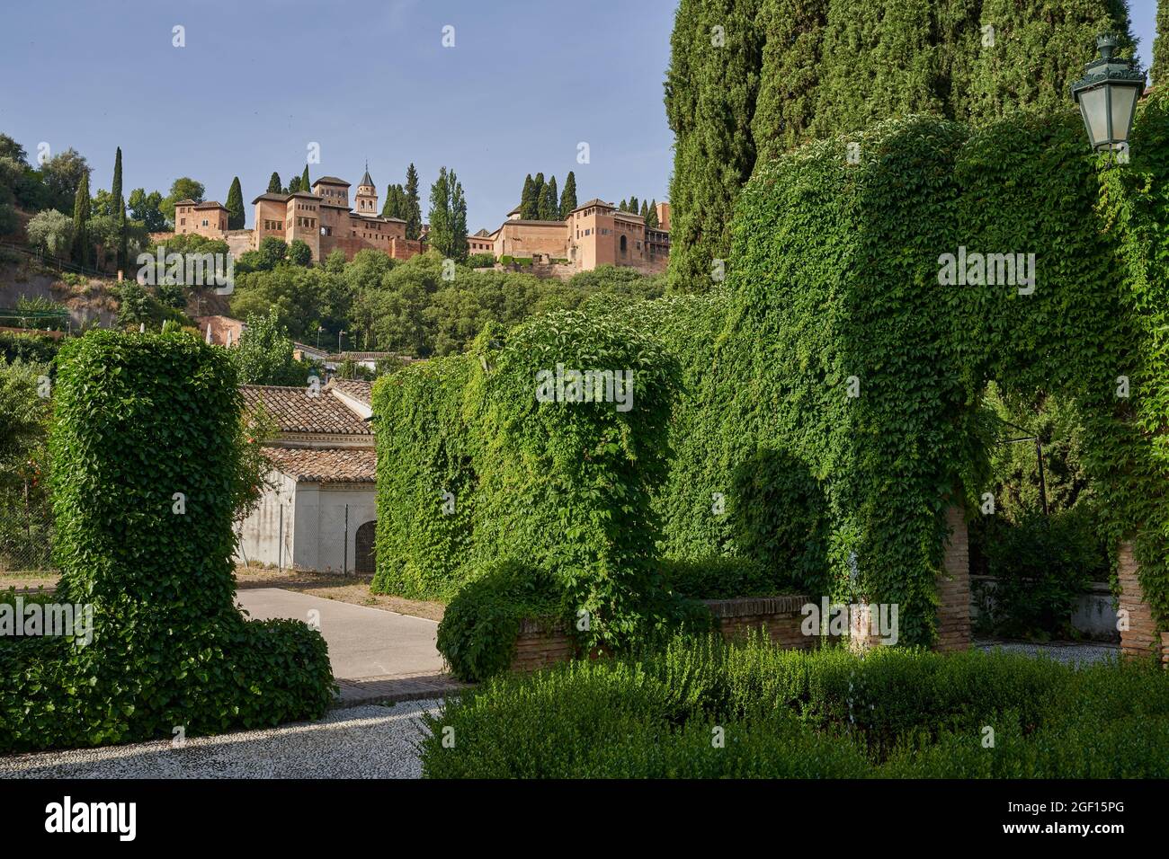 Monumental Alhambra in Granada from the Cordoba gardens in Spain.  Stock Photo