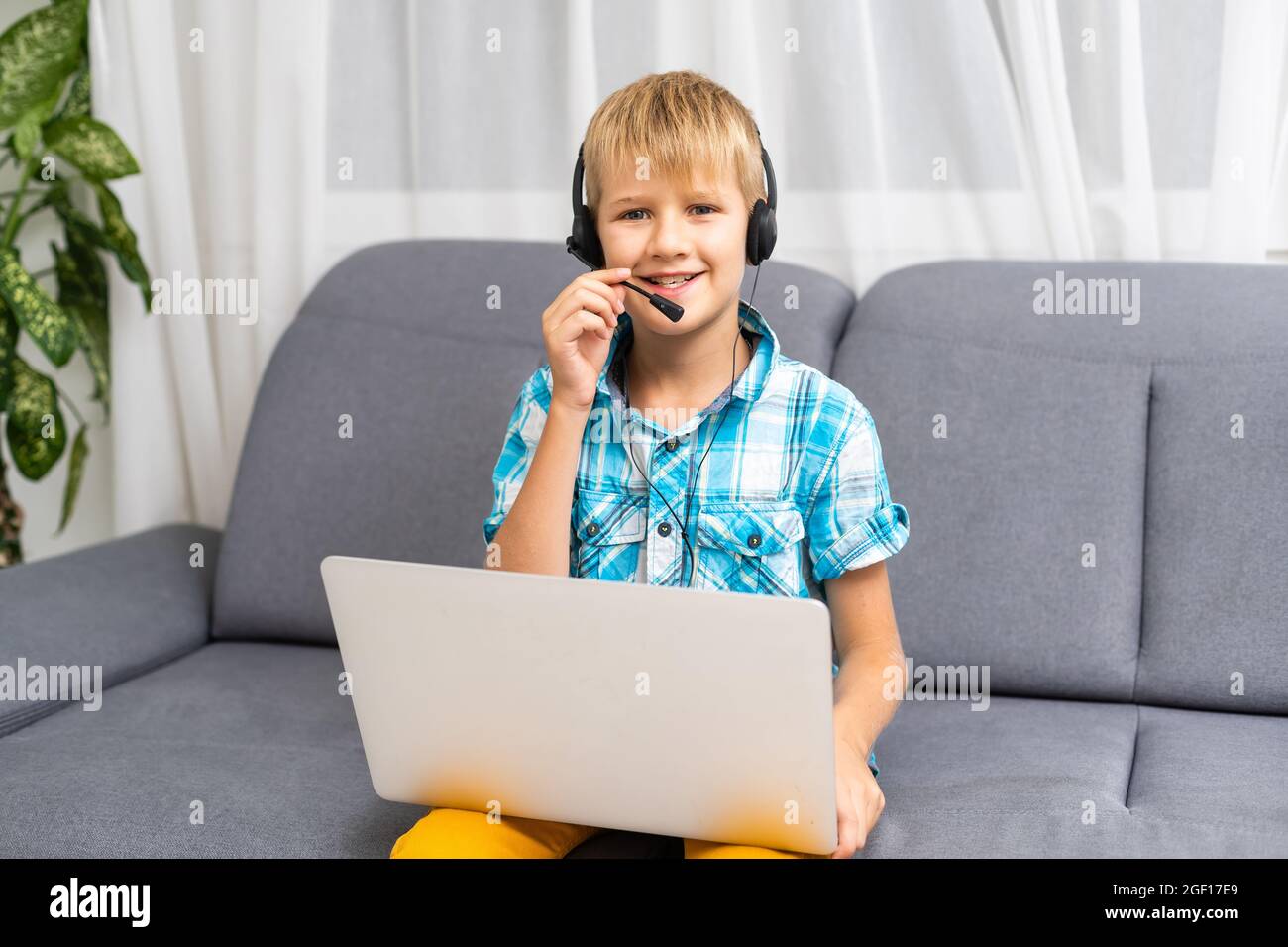 The little boy with laptop at home Stock Photo - Alamy