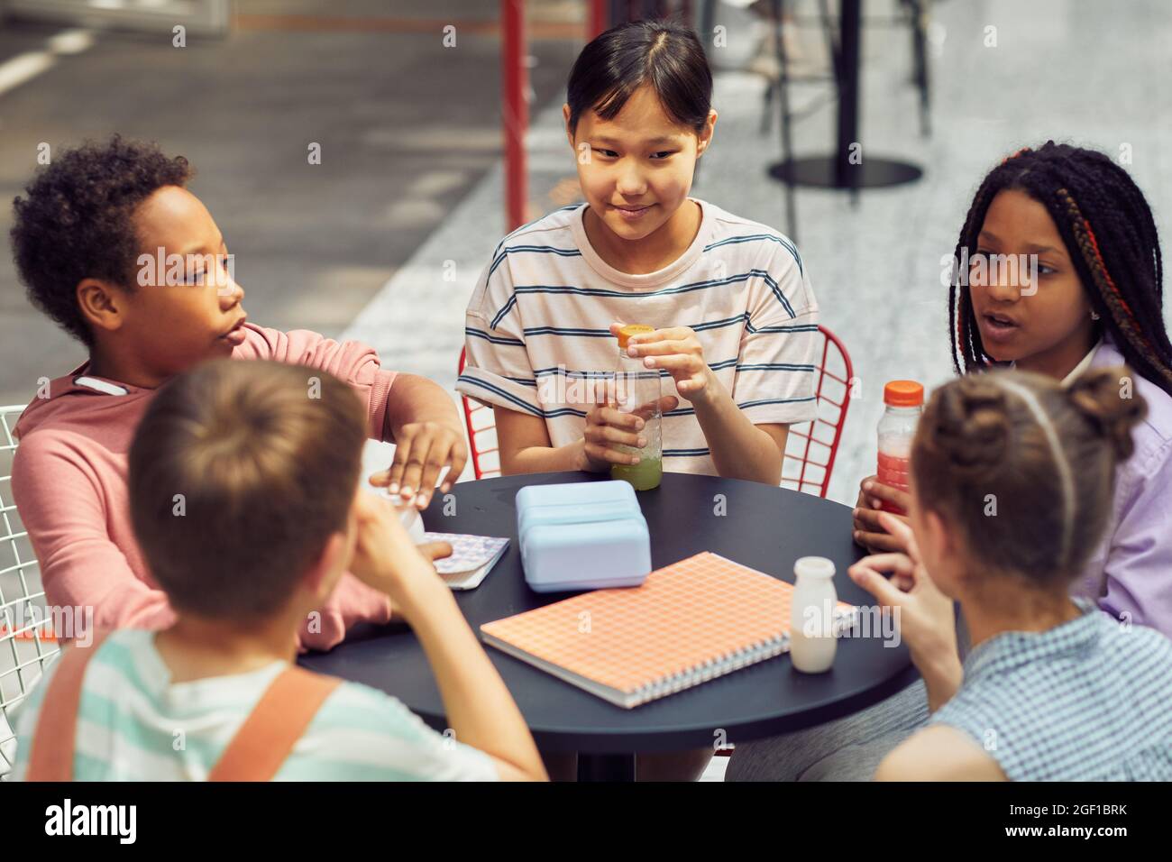 Multi ethnic school table hi-res stock photography and images - Alamy