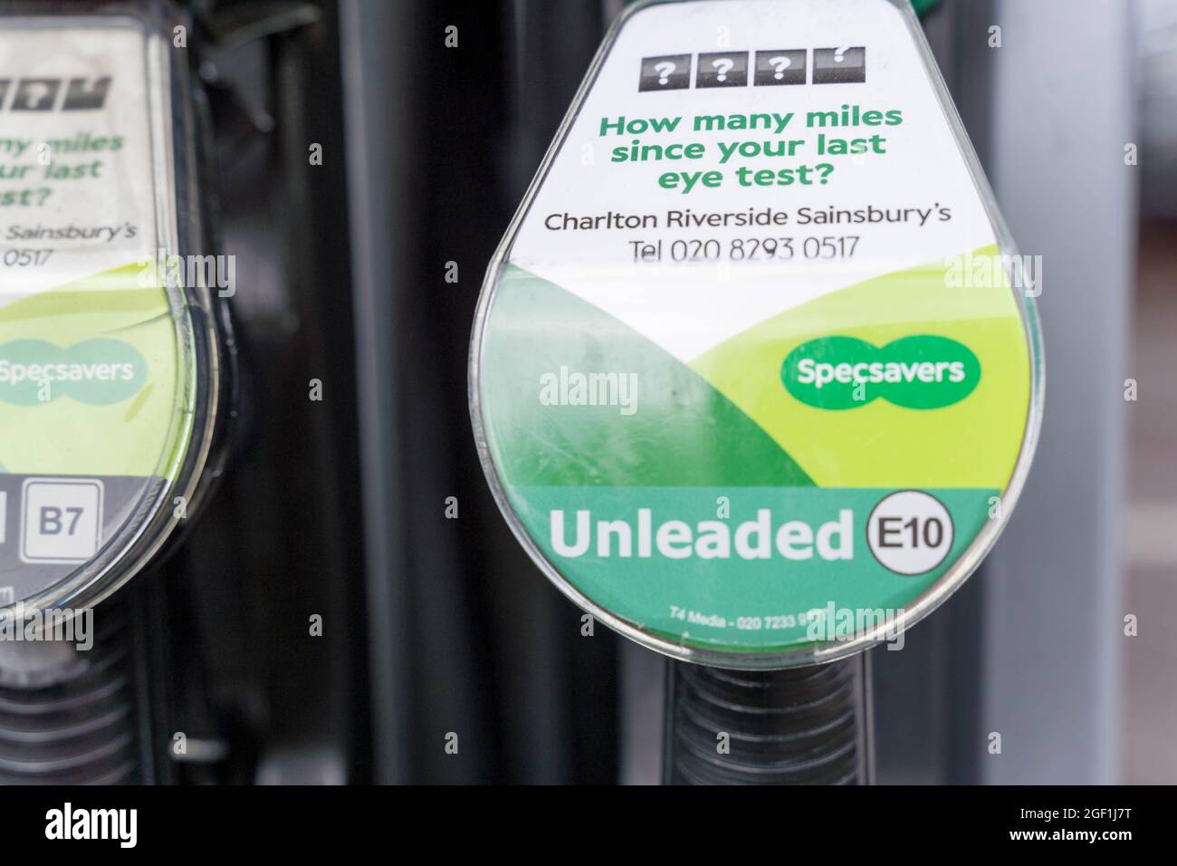 Unleaded E10 fuel nozzle in petrol station Kent, UK, fuel regulation change Stock Photo