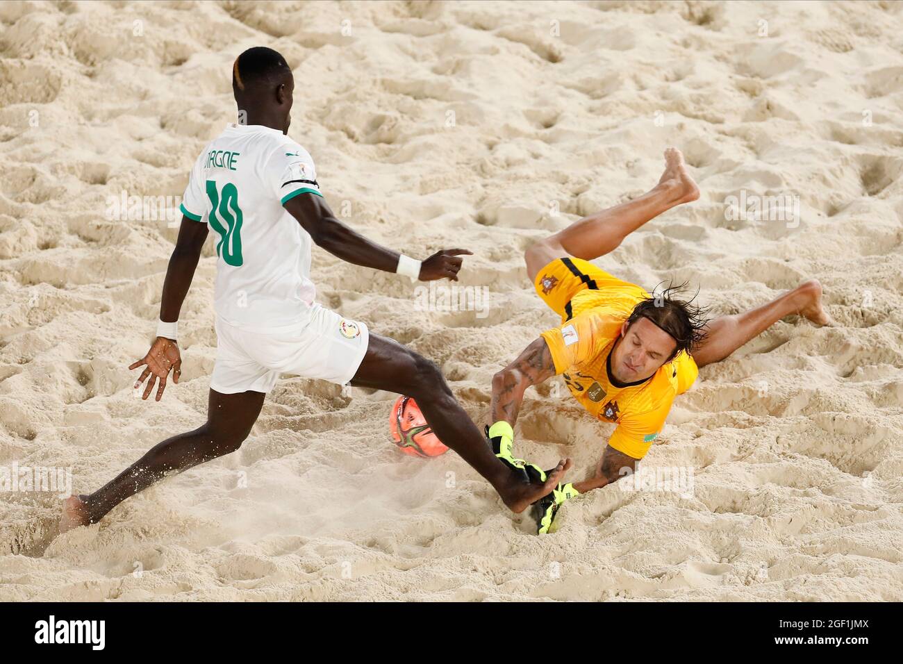 Moscow, Russia. 22nd August 2021; Luzhniki Stadium, Moscow, Russia: FIFA World Cup Beach Football tournament; Elinton Andrade from Portugal challenges Mamour Diagne from Senegal, during the match between Portugal and Senegal, in the 2nd round of Group D Credit: Action Plus Sports Images/Alamy Live News Stock Photo