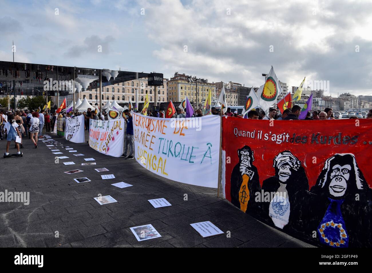 Marseille, France. 21st Aug, 2021. Protesters hold banners during the demonstration against fascism in Marseille.Kurds gathered at the Old Port of Marseille to protest against the Turkish airstrikes in Senegal and also to support the people of Afghanistan after the Taliban took overpower. (Photo by Gerard Bottino/SOPA Images/Sipa USA) Credit: Sipa USA/Alamy Live News Stock Photo