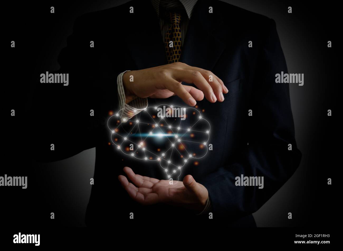 businessman hand holding brain in palm Stock Photo - Alamy