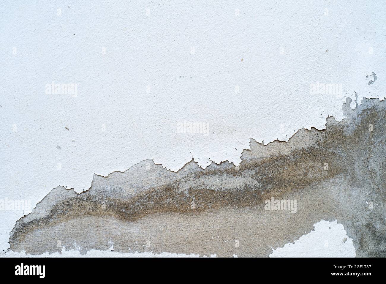Old peeling wall paint background Stock Photo