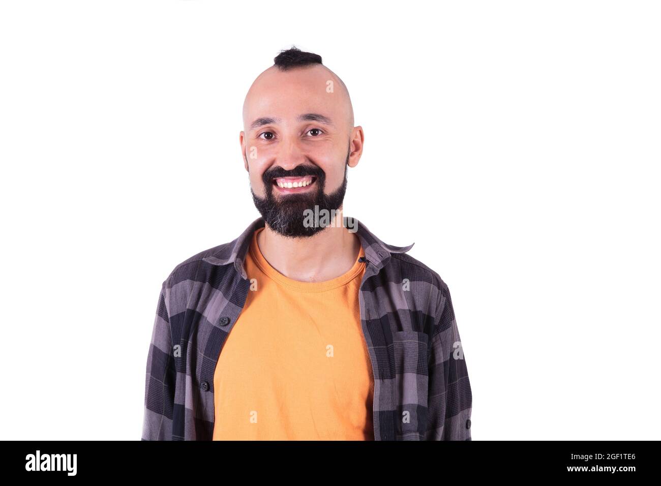 Happy young man grinning and looking at camera Stock Photo