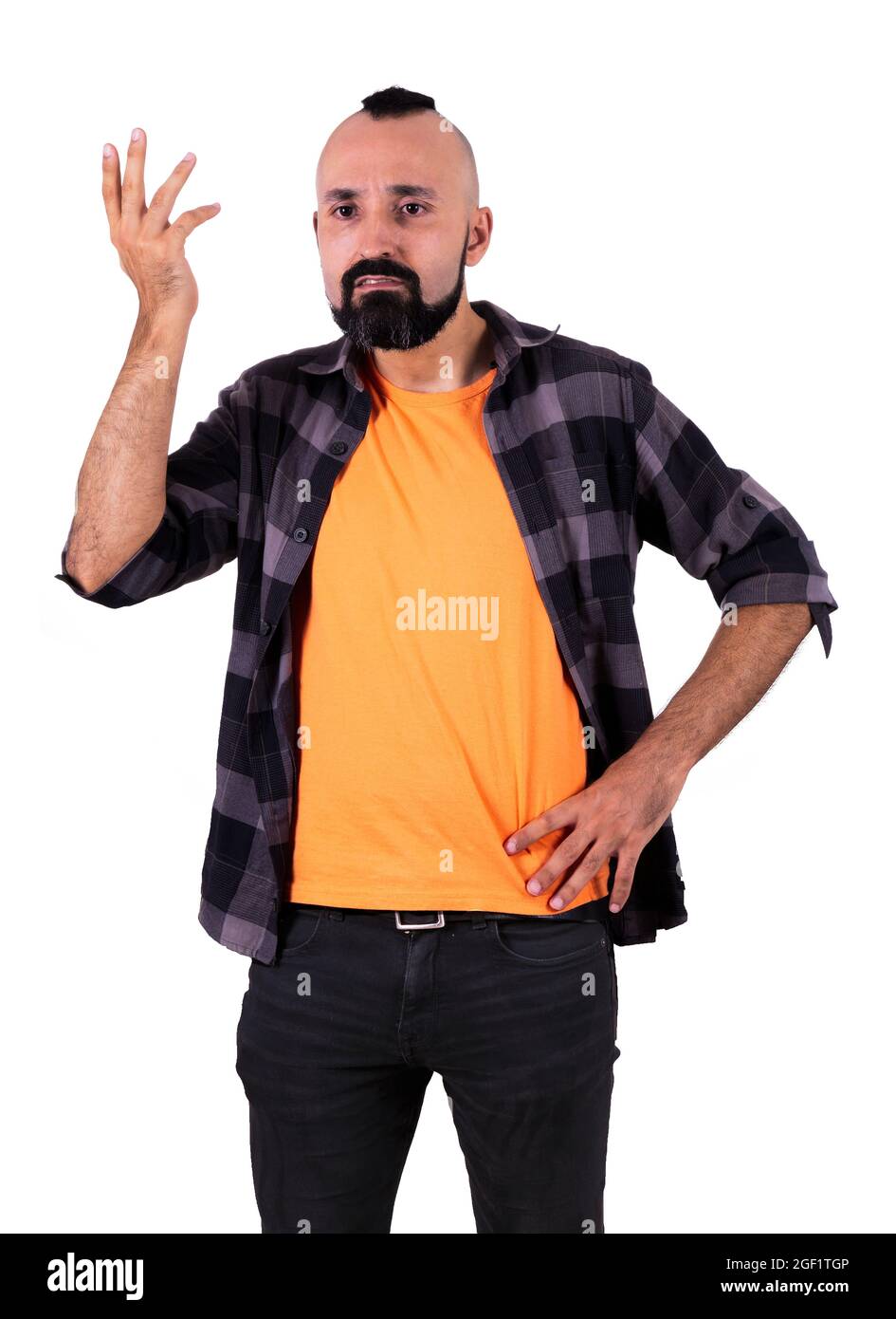 Portrait of a confused young man gesturing Stock Photo