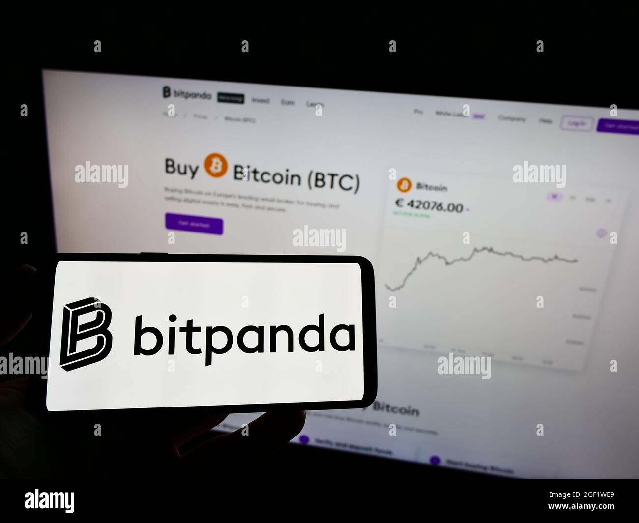 Smartphone with website of Austrian crypto exchange company Bitpanda GmbH  on screen in front of business logo. Focus on top-left of phone display  Stock Photo - Alamy