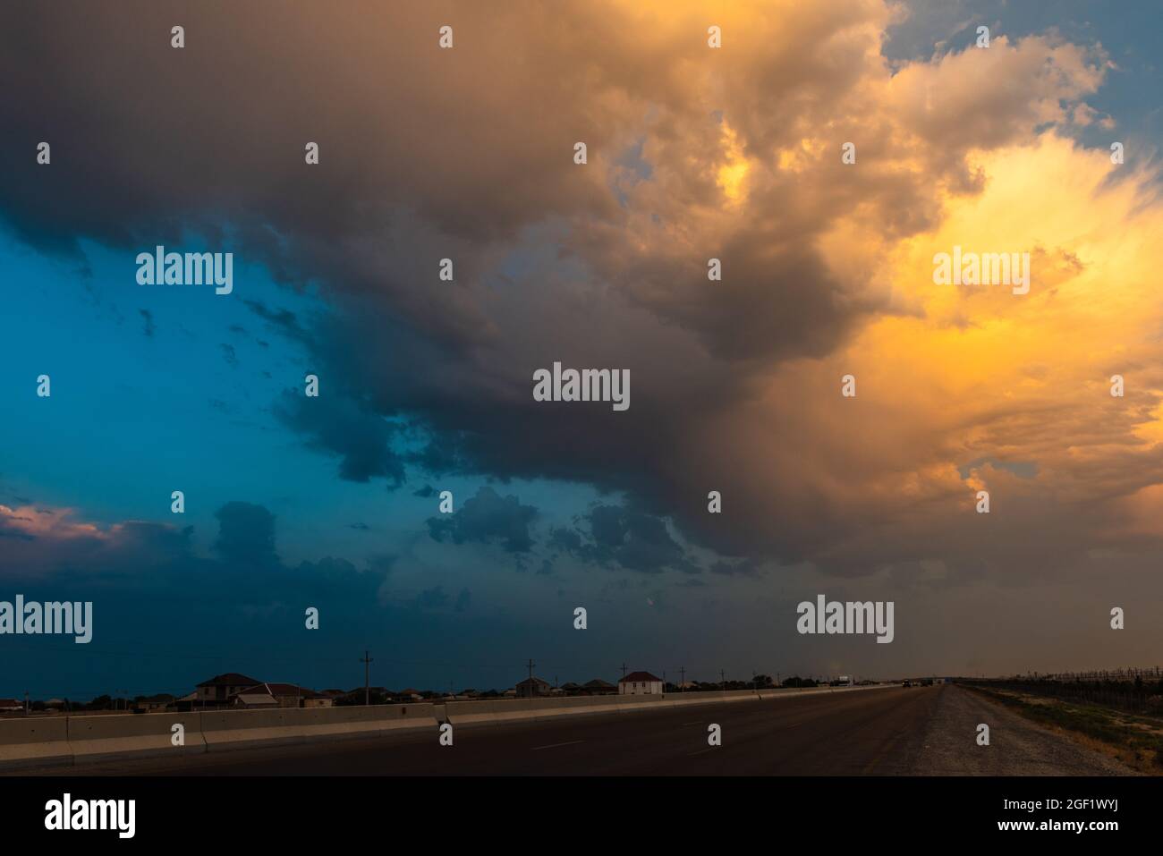 Beautiful sunset sky with clouds over highway Stock Photo - Alamy