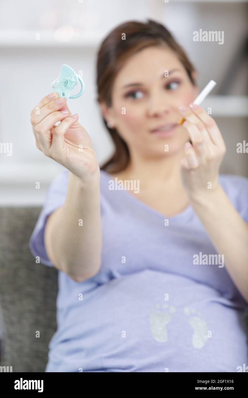 cigarette mum Smoking mum with baby hi-res stock photography and images
