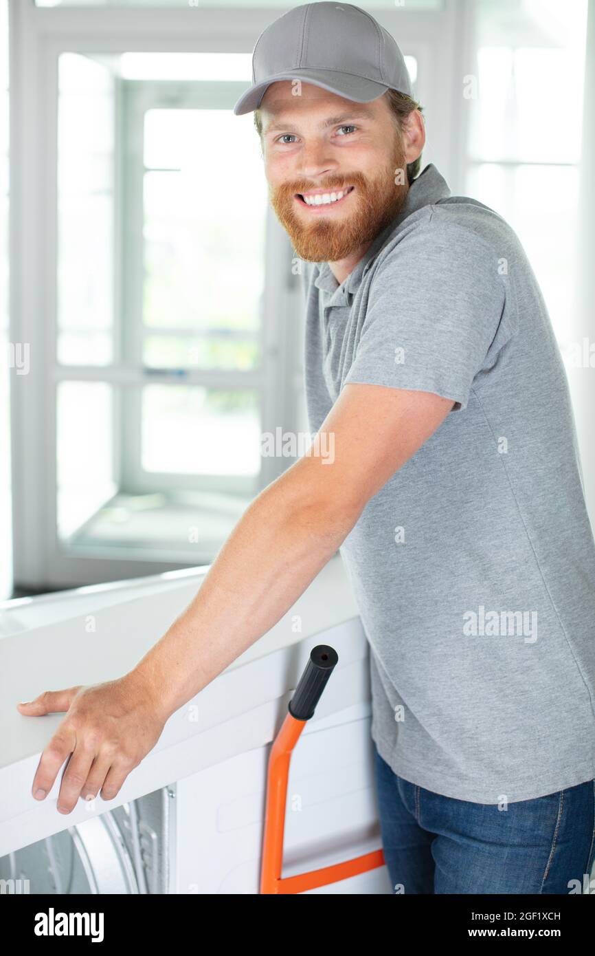 portrait of white goods delivery man Stock Photo Alamy