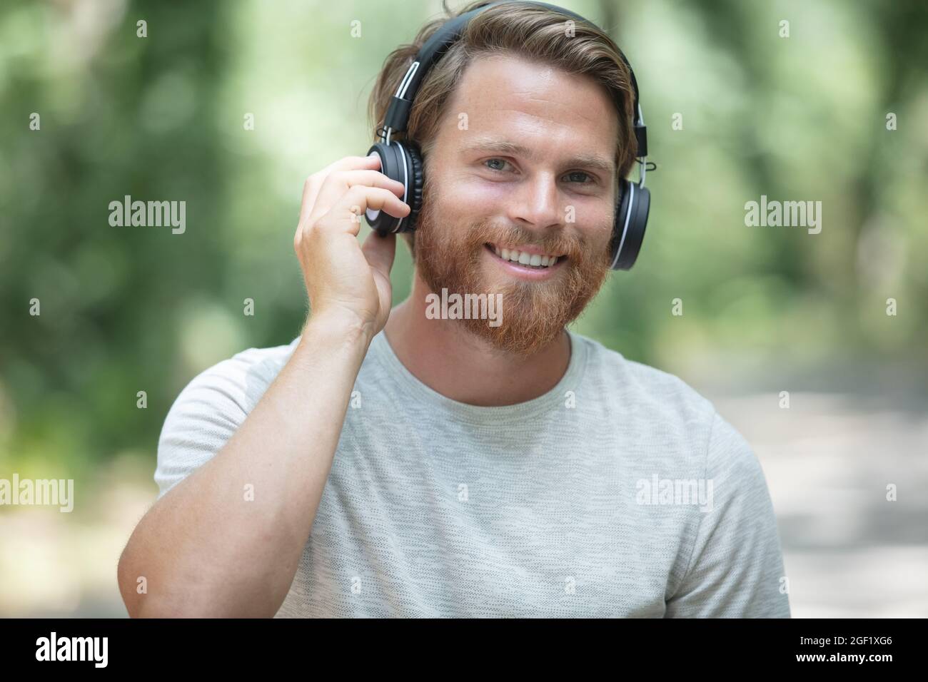 Young happy redhead man wearing hi-res stock photography and images - Alamy
