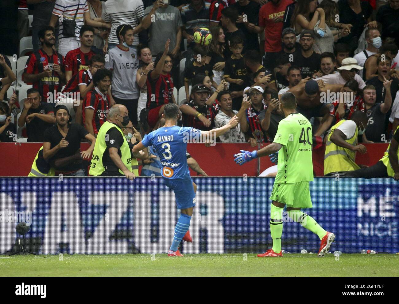 Incidents between players of Marseille - among them Alvaro Gonzalez of OM who throws the ball towards the supporters - and supporters of OGC Nice who entered the pitch during the French championship Ligue 1 football match between OGC Nice (OGCN) and Olympique de Marseille (OM) on August 22, 2021 at Allianz Riviera stadium in Nice, France - Photo Jean Catuffe / DPPI Stock Photo