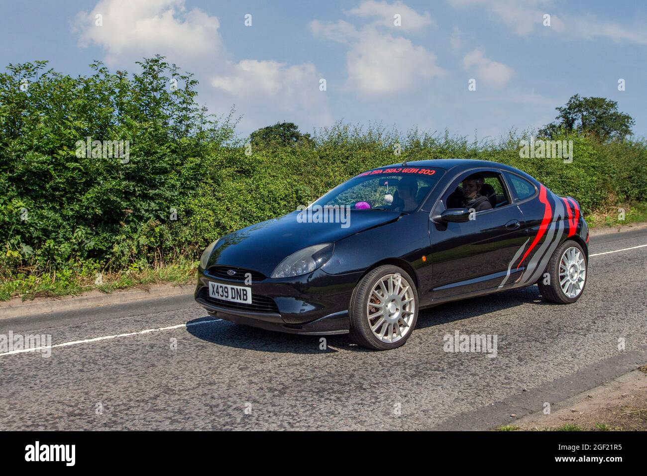 bladeren genie gekruld 2001 black Ford Puma 1.7 16v Millenium 5 speed manual, 1679cc 2dr coupe  en-route to Capesthorne Hall classic July car show, Cheshire, UK Stock  Photo - Alamy