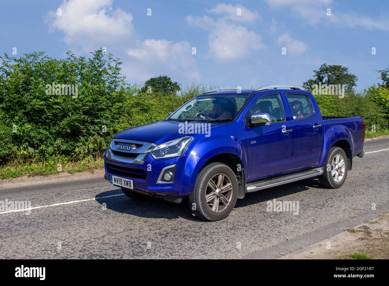 2019 blue Isuzu D-Max Utah V-Cross 6 speed manual 1898 cc Diesel Pick-up en-route to Capesthorne Hall classic July car show, Cheshire, UK Stock Photo