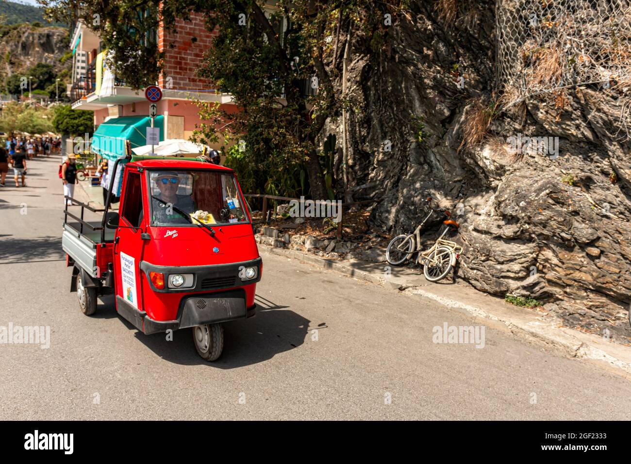 Monterosso, Italy - August 10, 2021: Piaggio Ape, a traditional three wheels car used for transportings stuffs Stock Photo
