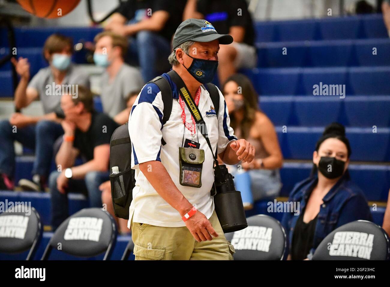 CIF Southern Section photographer Heston Quan arrives during the 2021 CIF Southern Section Championship basketball game on Friday, June 11, 2021, in C Stock Photo