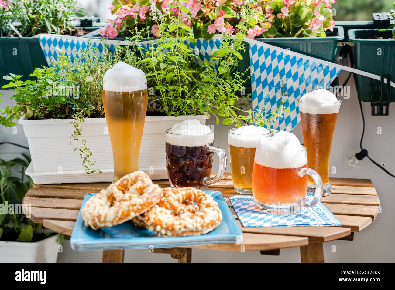 Close up of many beer glasses on wooden table Stock Photo