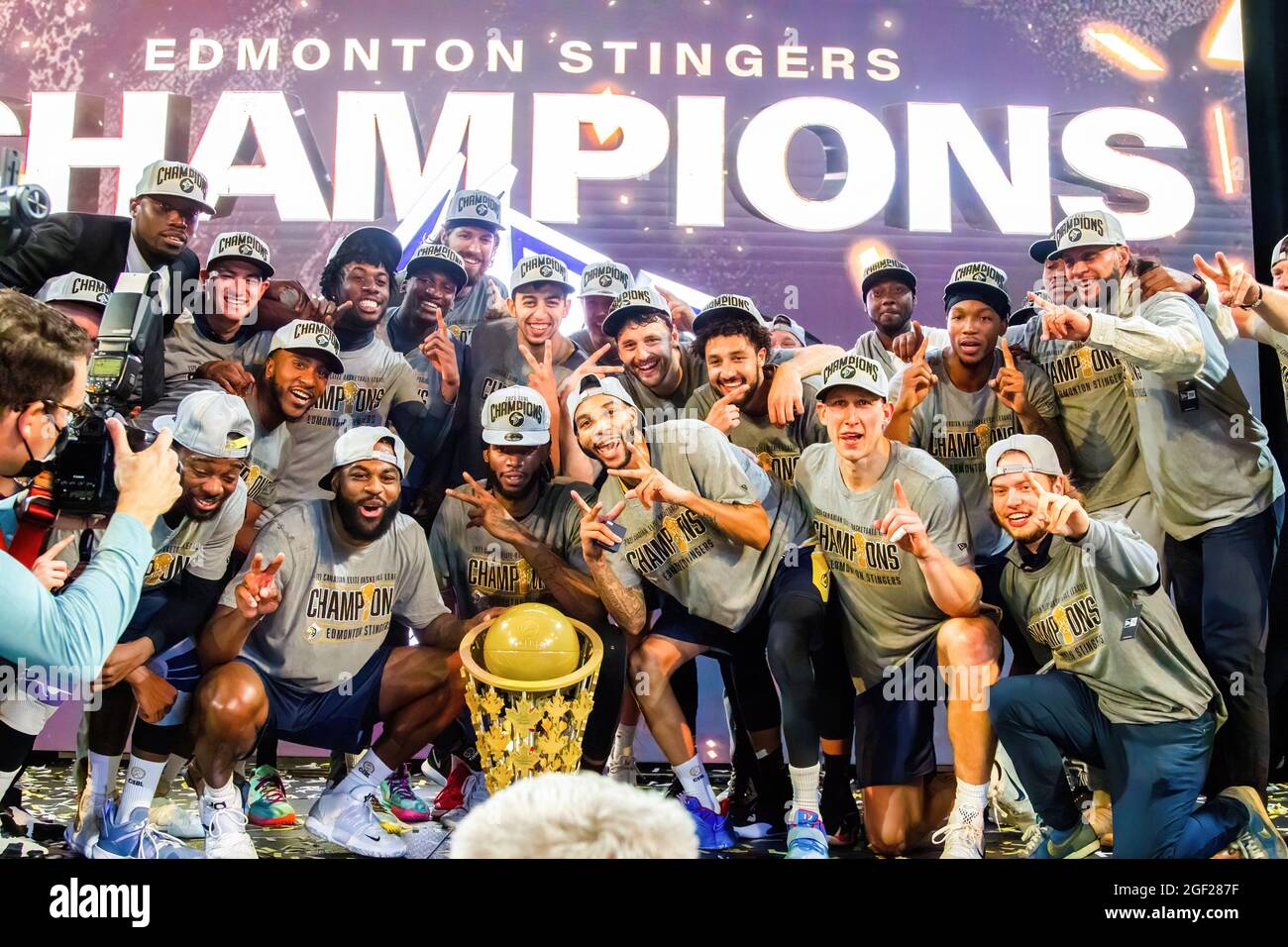 Edmonton Stingers pose with the Champions Cup after the Canadian Elite Basketball Season Final between the Edmonton Stingers and the Niagara River Lions at the Edmonton Expo Center. The Edmonton Stingers claim their second straight CEBL Championship. (Photo by Ron Palmer / SOPA Images/Sipa USA) Stock Photo