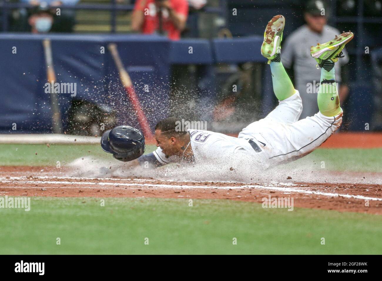 St. Petersburg, FL. USA; Tampa Bay Rays shortstop Wander Franco (5) slides  awkwardly into home plate and injures his forehead during a major league b  Stock Photo - Alamy