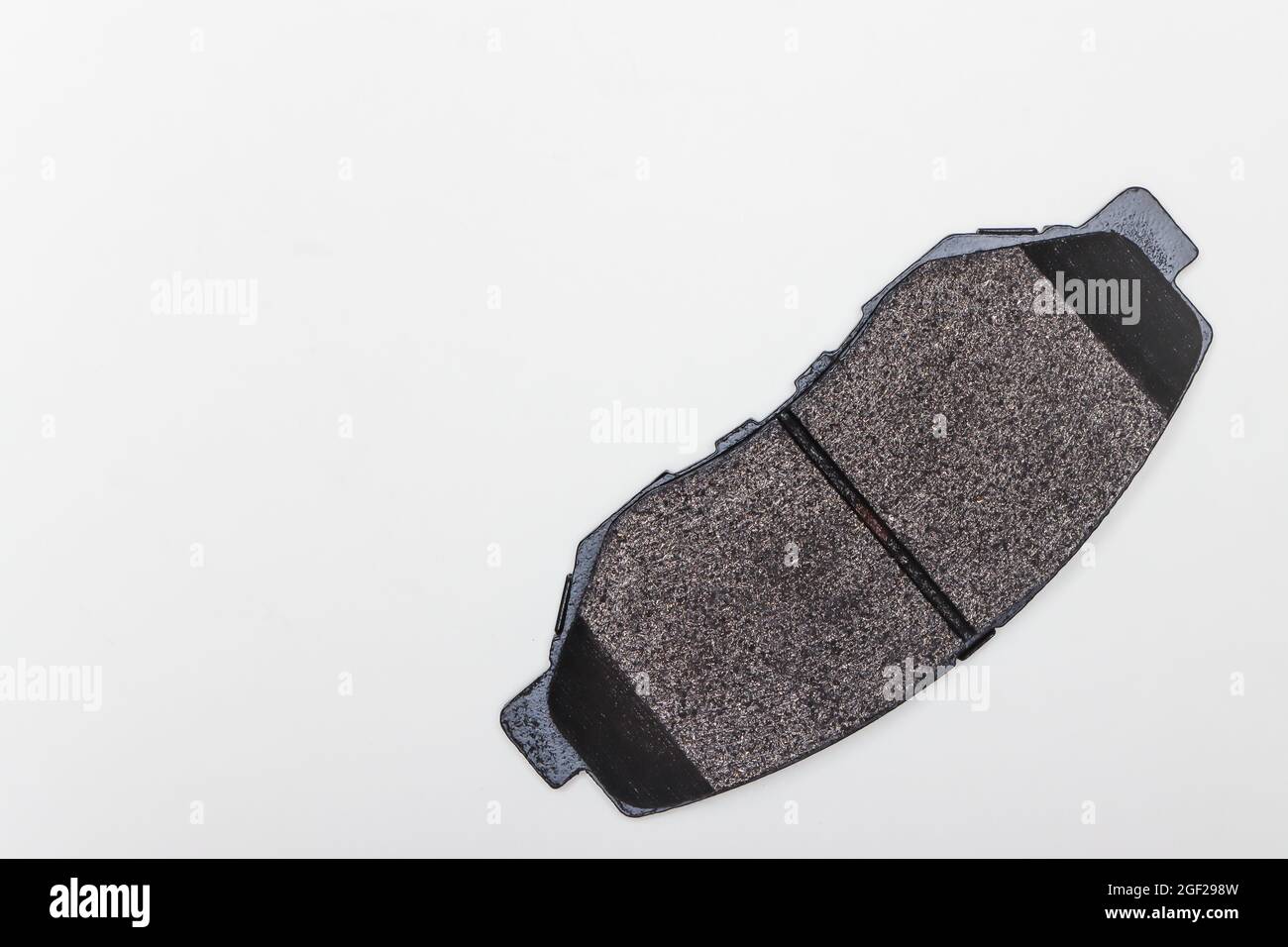 One brake pad, new parts for car repair. A set of spare parts for