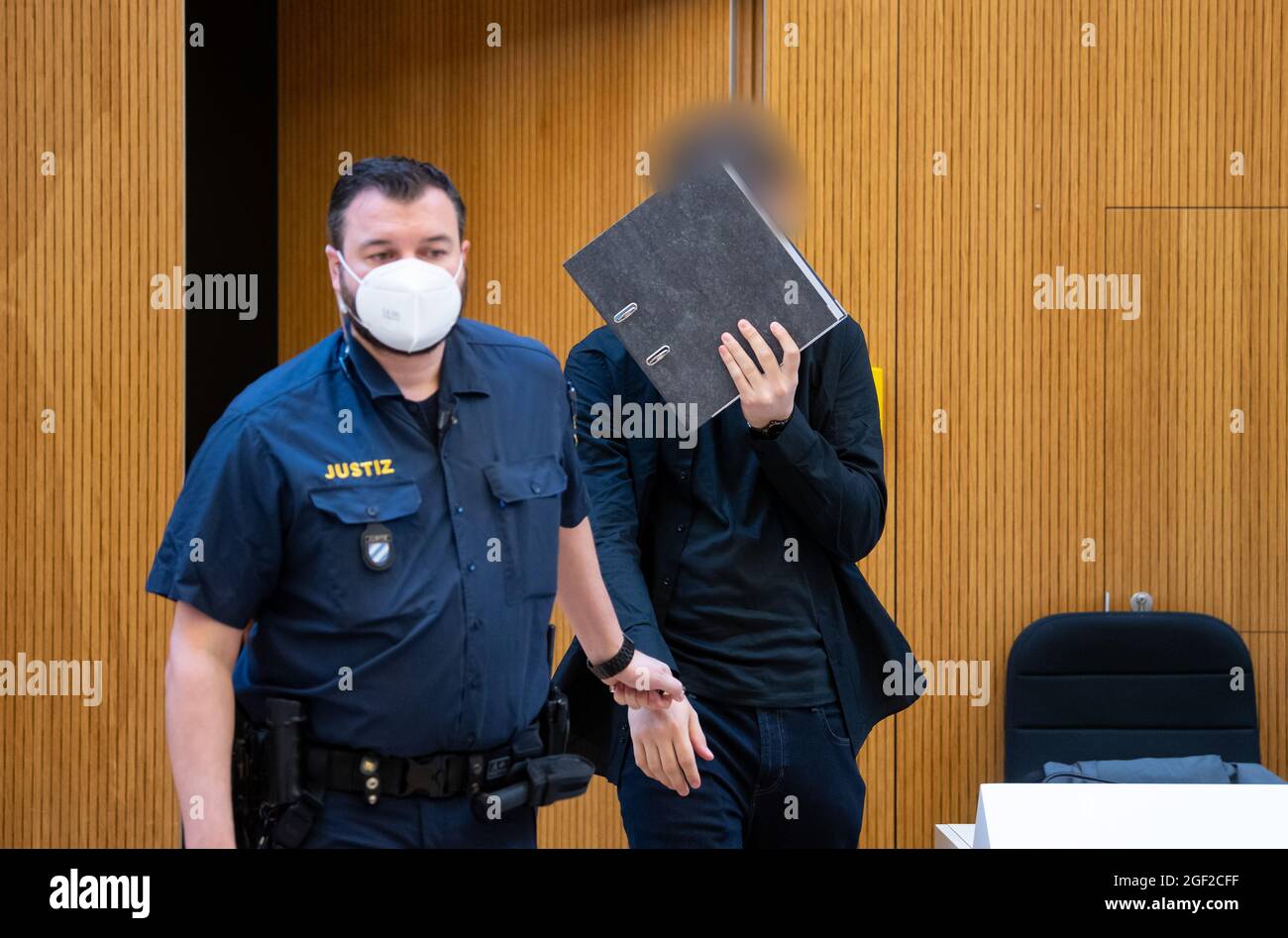Munich, Germany. 23rd Aug, 2021. One of two men charged with murder (r ...