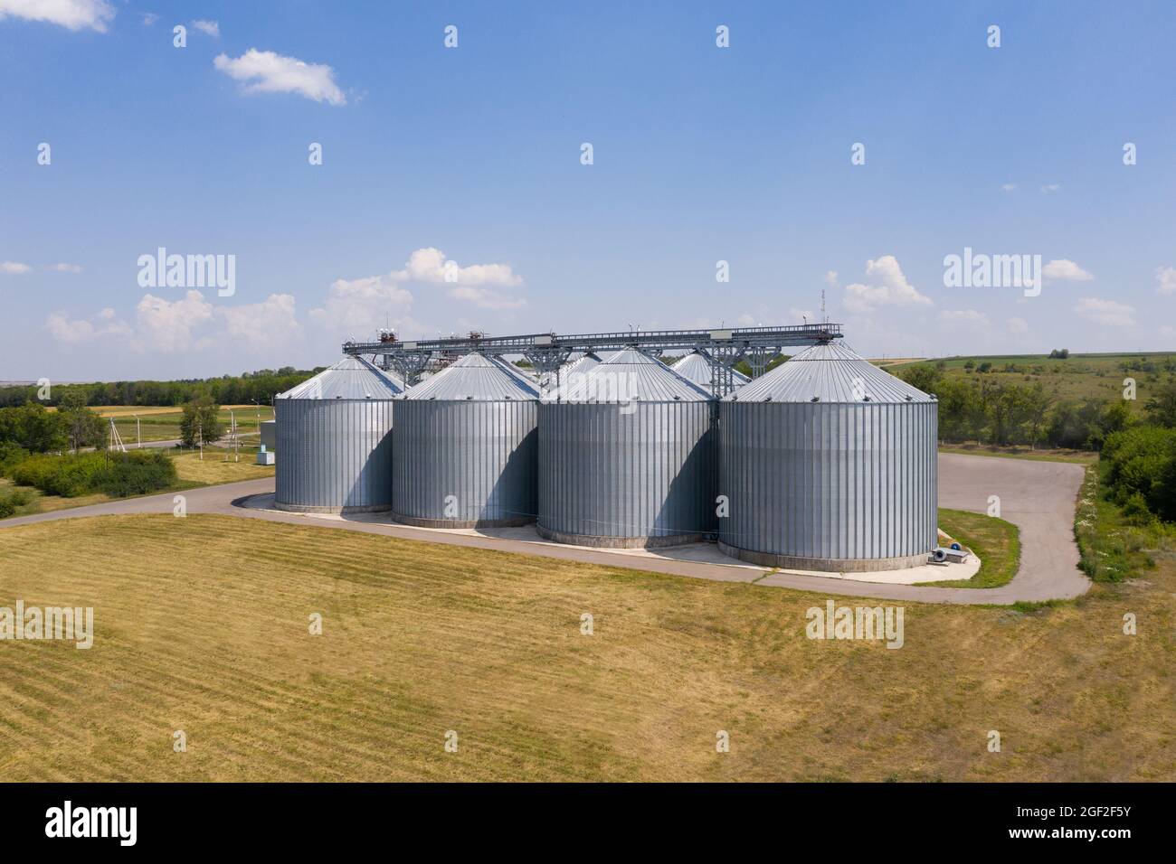 Aerial view of agricultural silos, grain elevator for storage and