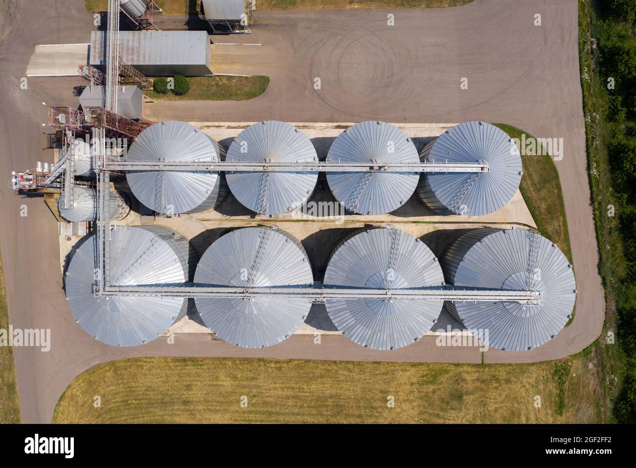 Aerial view of agricultural silos, grain elevator for storage and