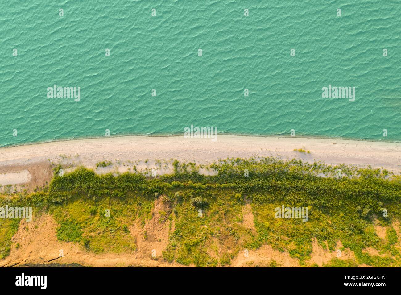 Sea coast. Aerial view of the beach and waves Stock Photo