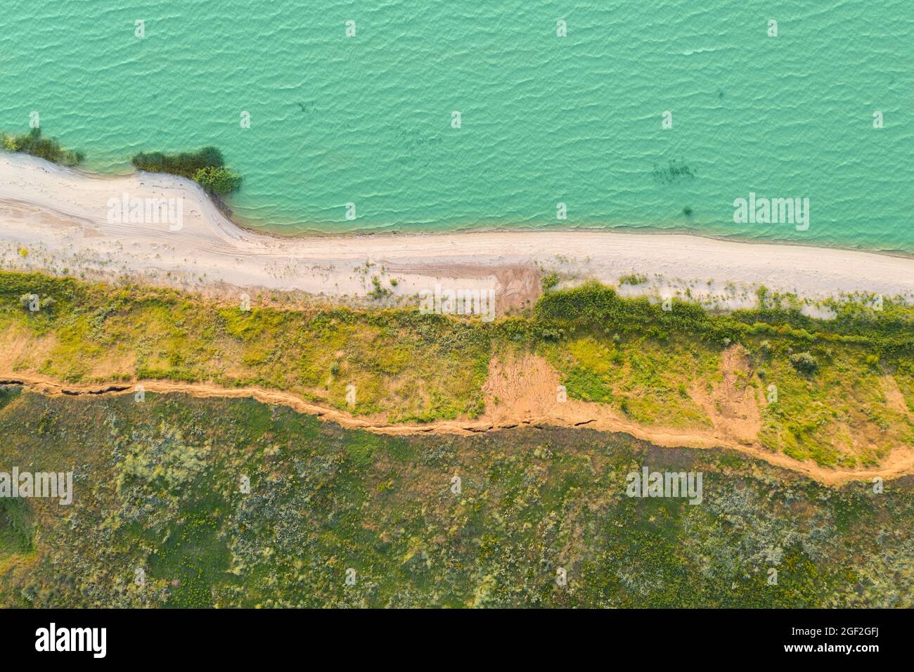 Sea coast. Aerial view of the beach and waves Stock Photo