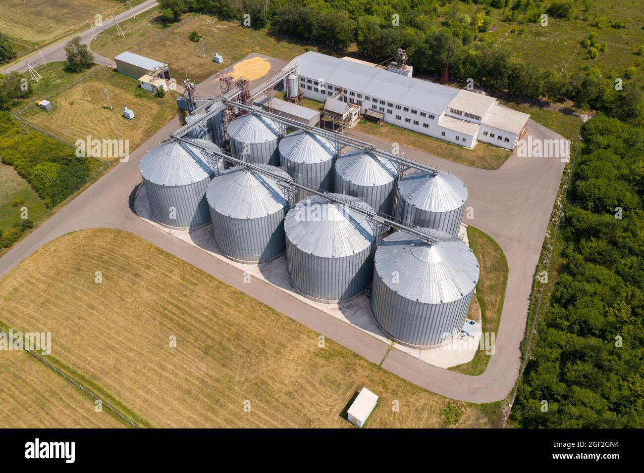 Aerial view of agricultural silos, grain elevator for storage and