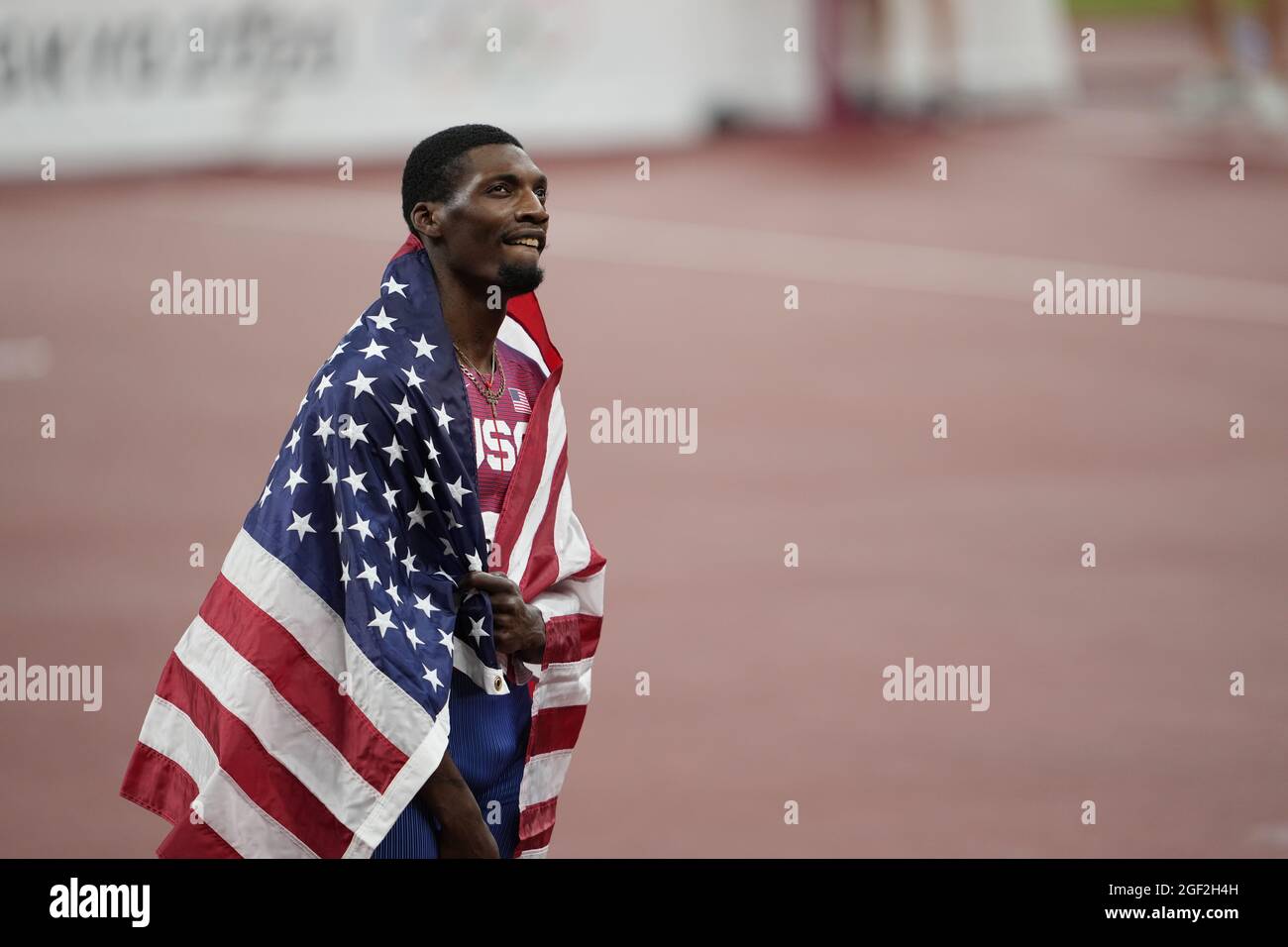 Fred Kerley running the 100 meters at the 2020 Tokyo Olympics Stock