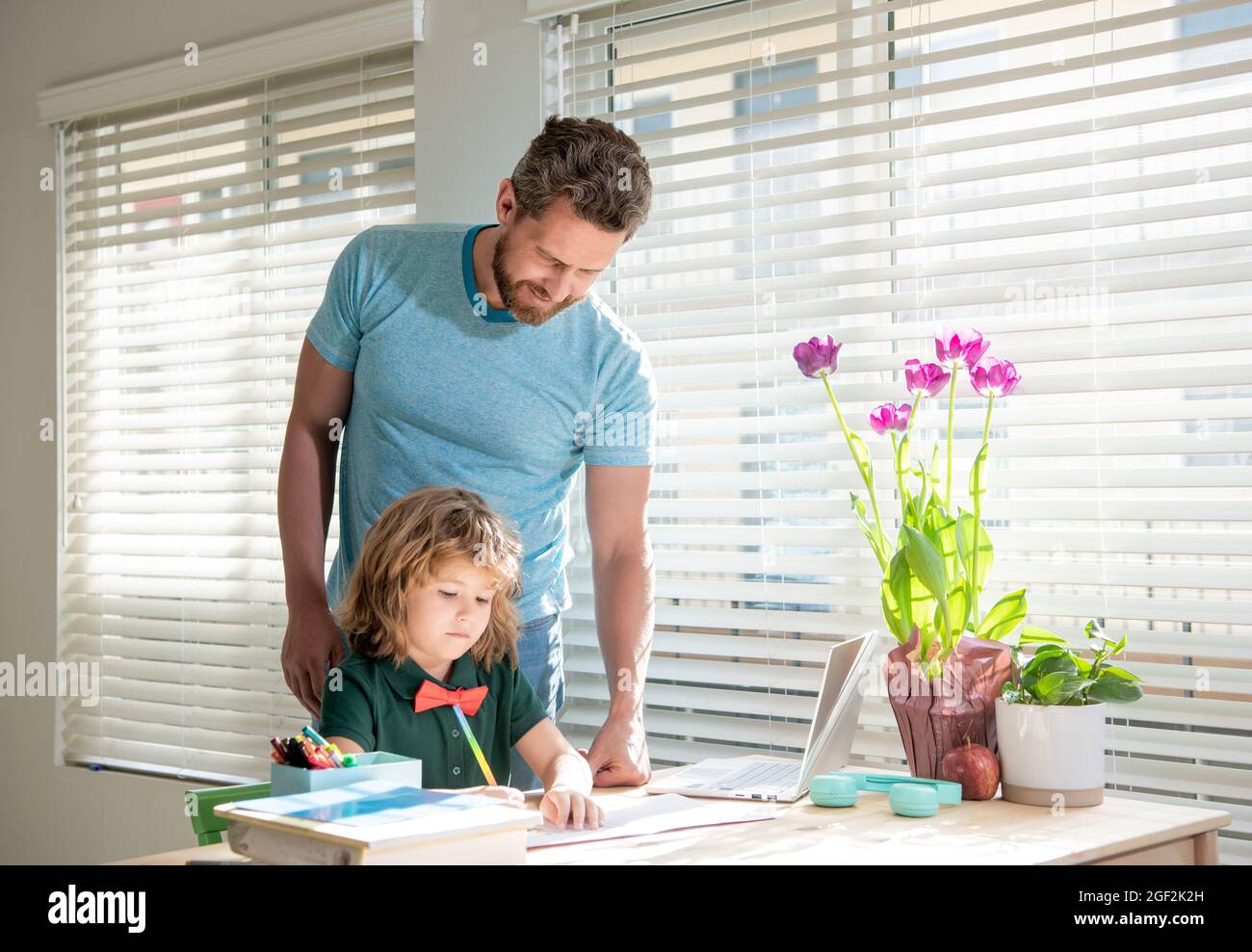 boy study with teacher. private drawing lesson. education concept. homeschooling and help. Stock Photo
