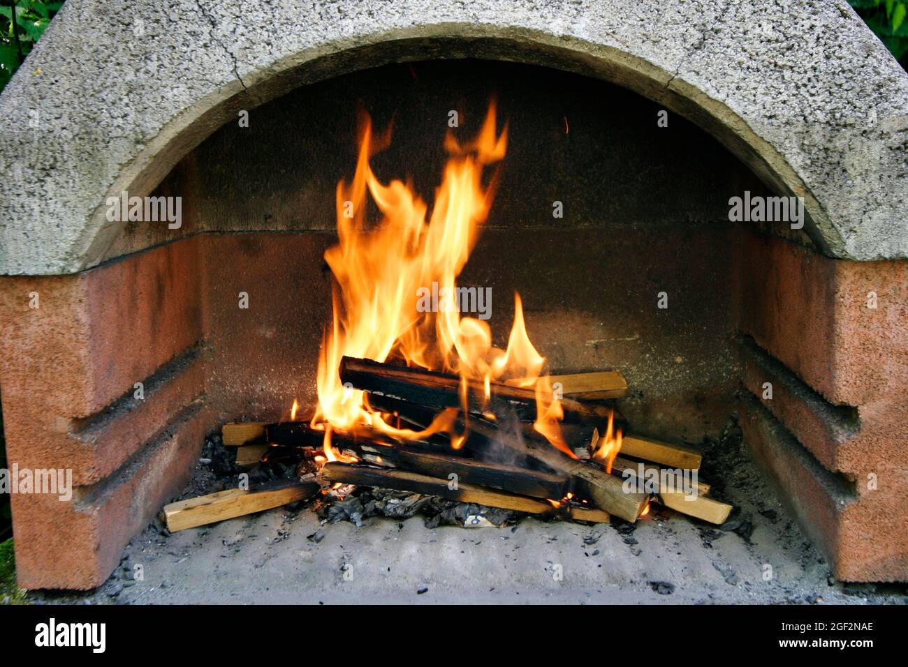 fire in a barbecue chimney Stock Photo - Alamy