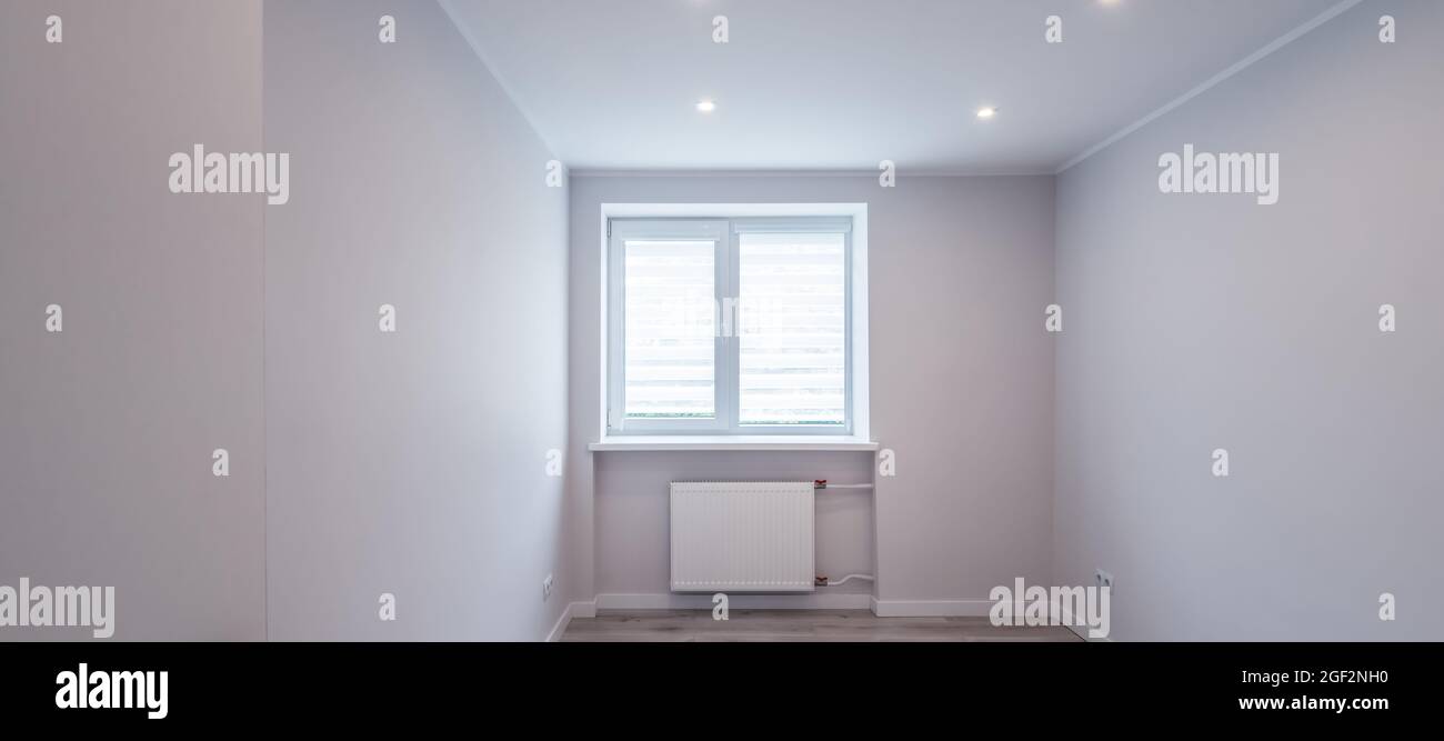 Contemporary interior of empty room. Apartment after renovation. White