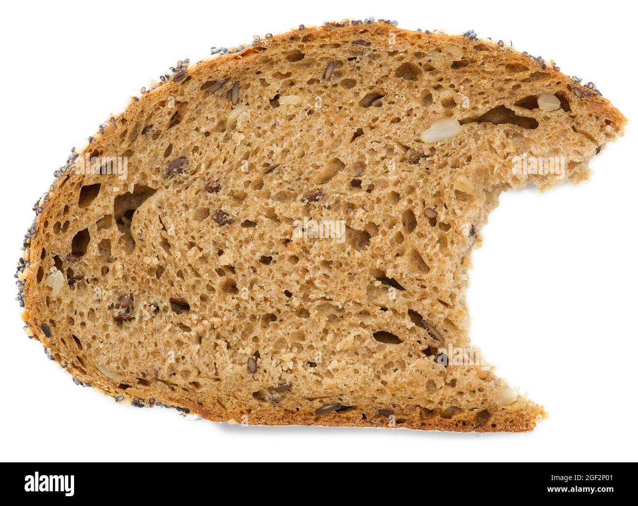 bitten into slice of whole grain bread Stock Photo