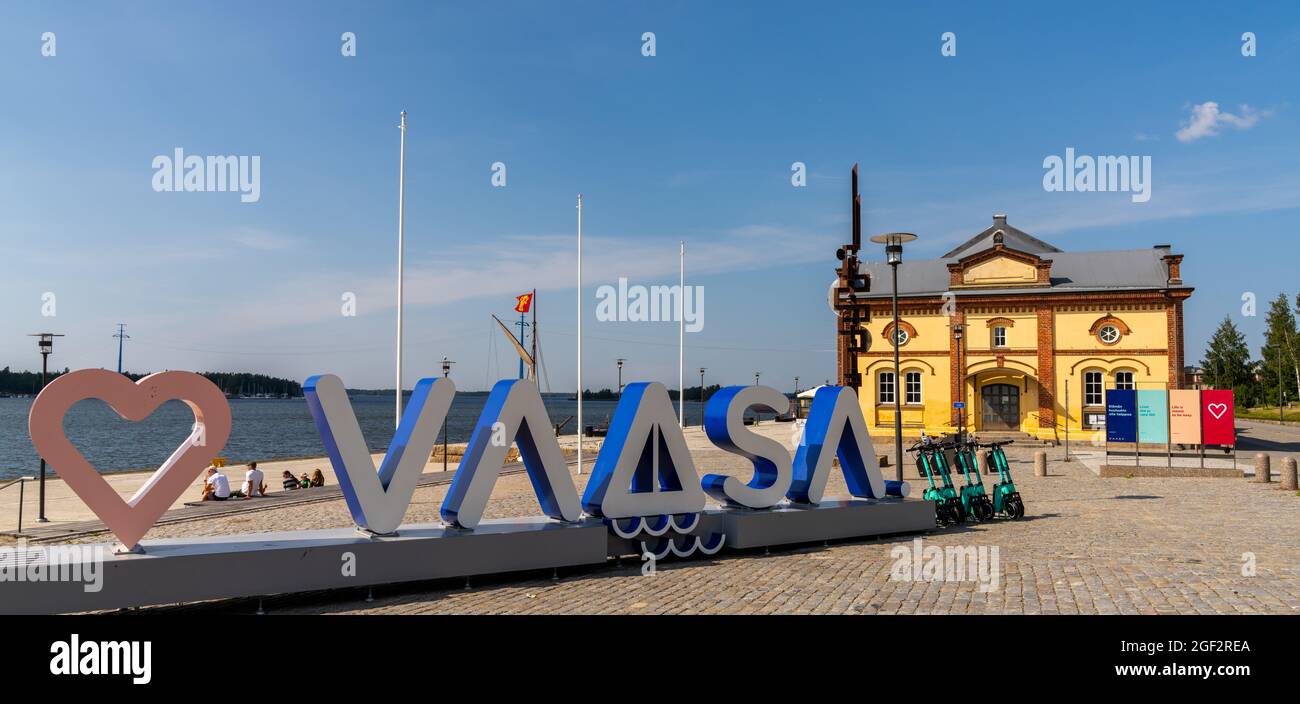 Vaasa, Finland: 28 July, 2021: Vaasa harborfront with the old harbormaster building and the Love Vaasa sign Stock Photo