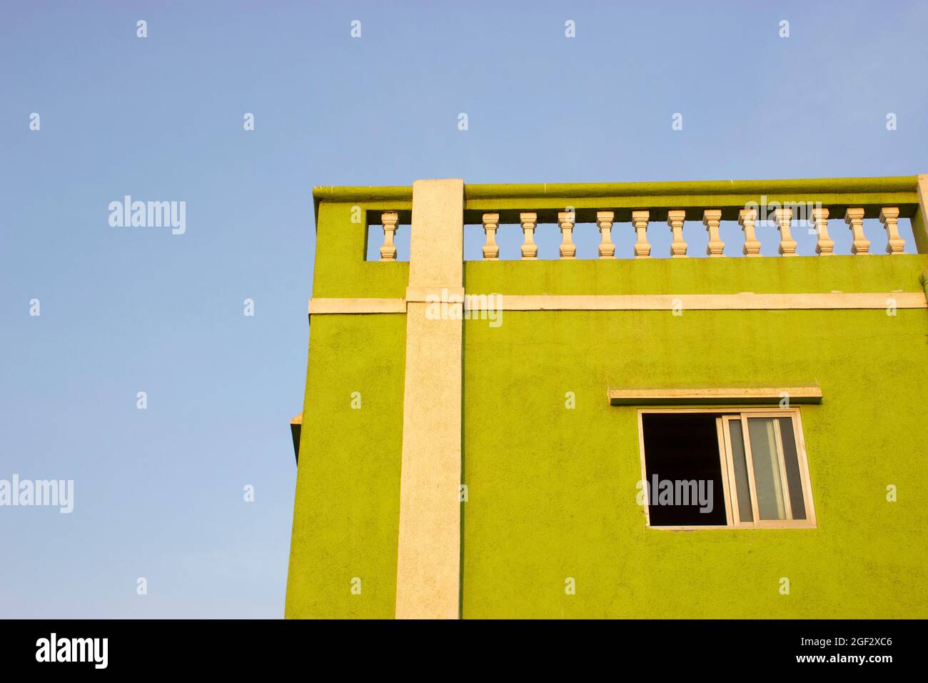 Minimal green coloured house, Worli Village, Mumbai, Maharashtra, India Stock Photo
