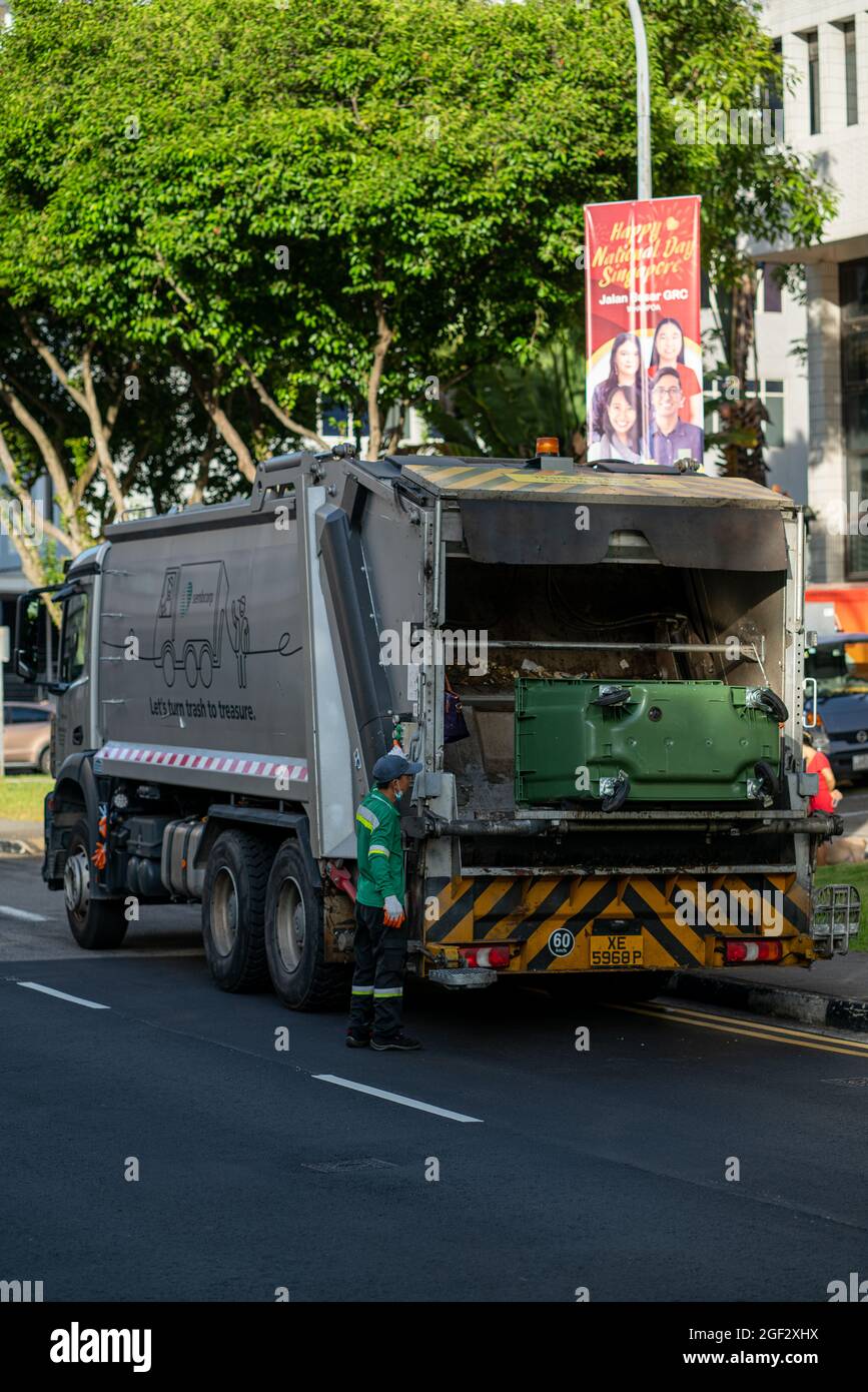 SINGAPORE, SINGAPORE Aug 14, 2021 Man operating garbage truck in