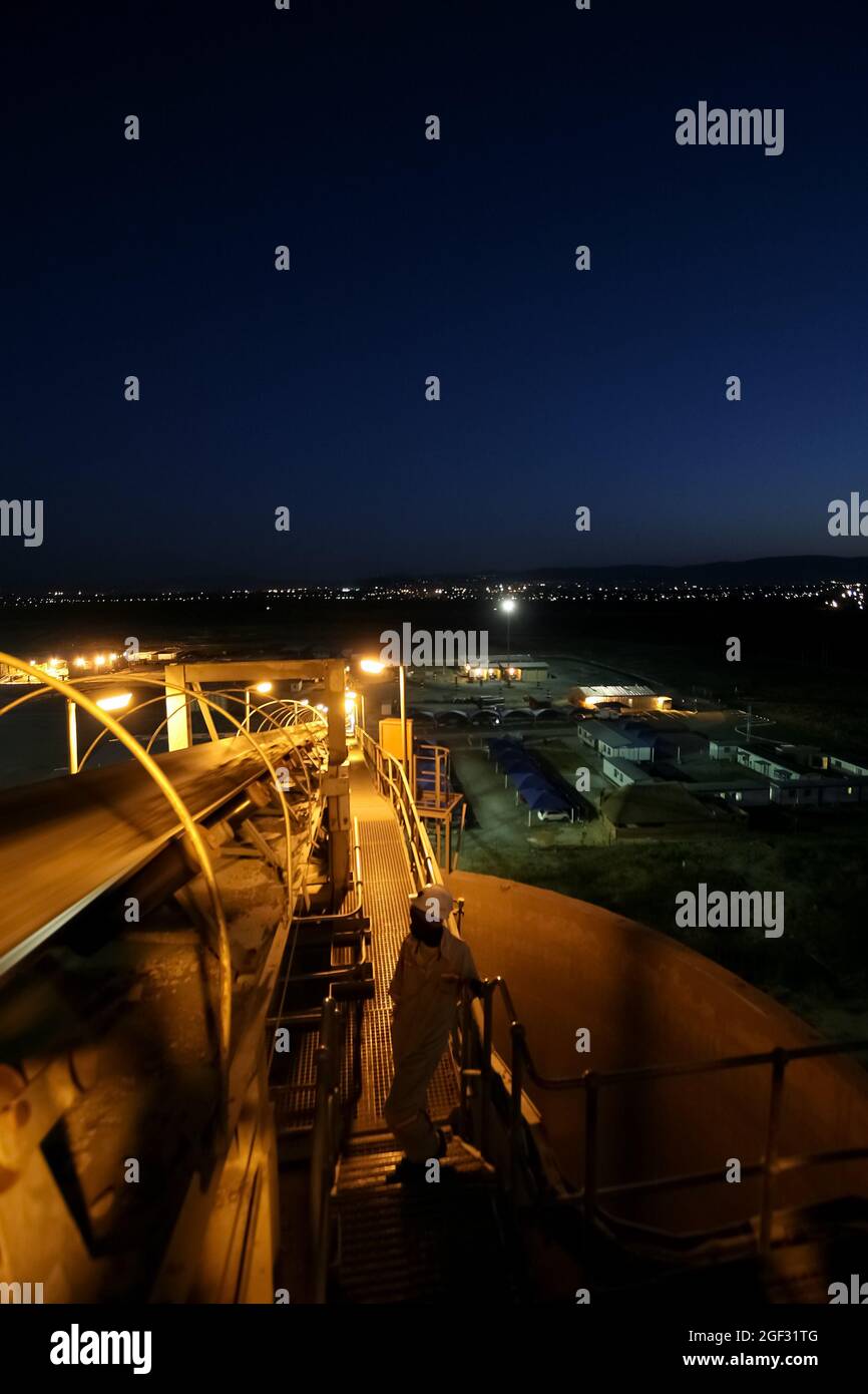 Conveyor belt for transporting ore rocks at precious metals mine in Johannesburg Stock Photo Alamy