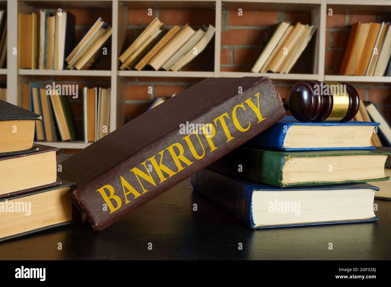 Bankruptcy law in the library with the gavel. Stock Photo