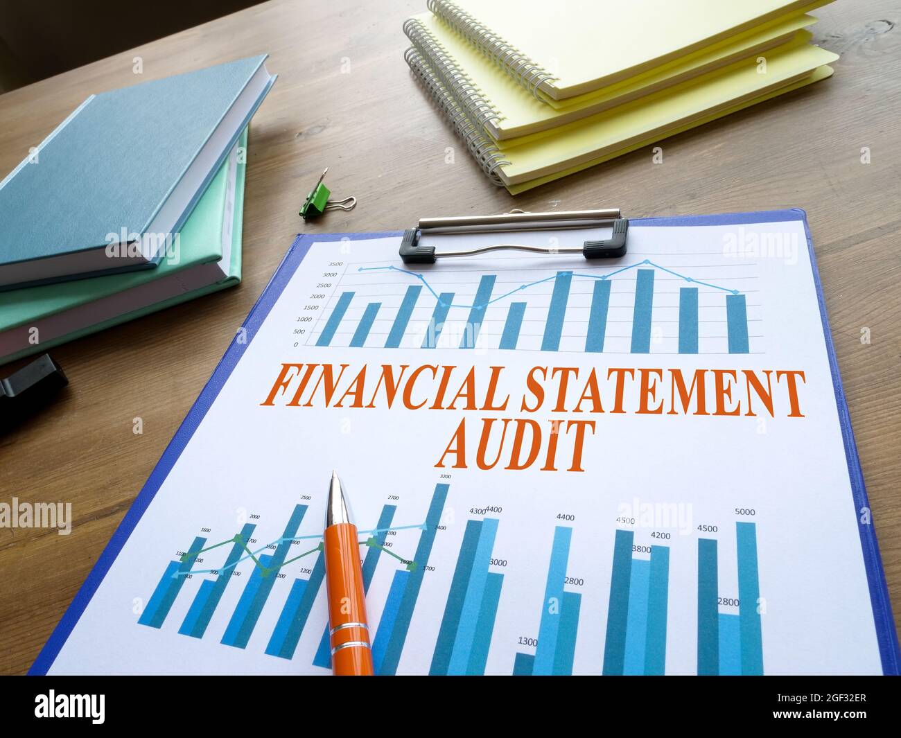 Financial statement audit report with business graph. Stock Photo